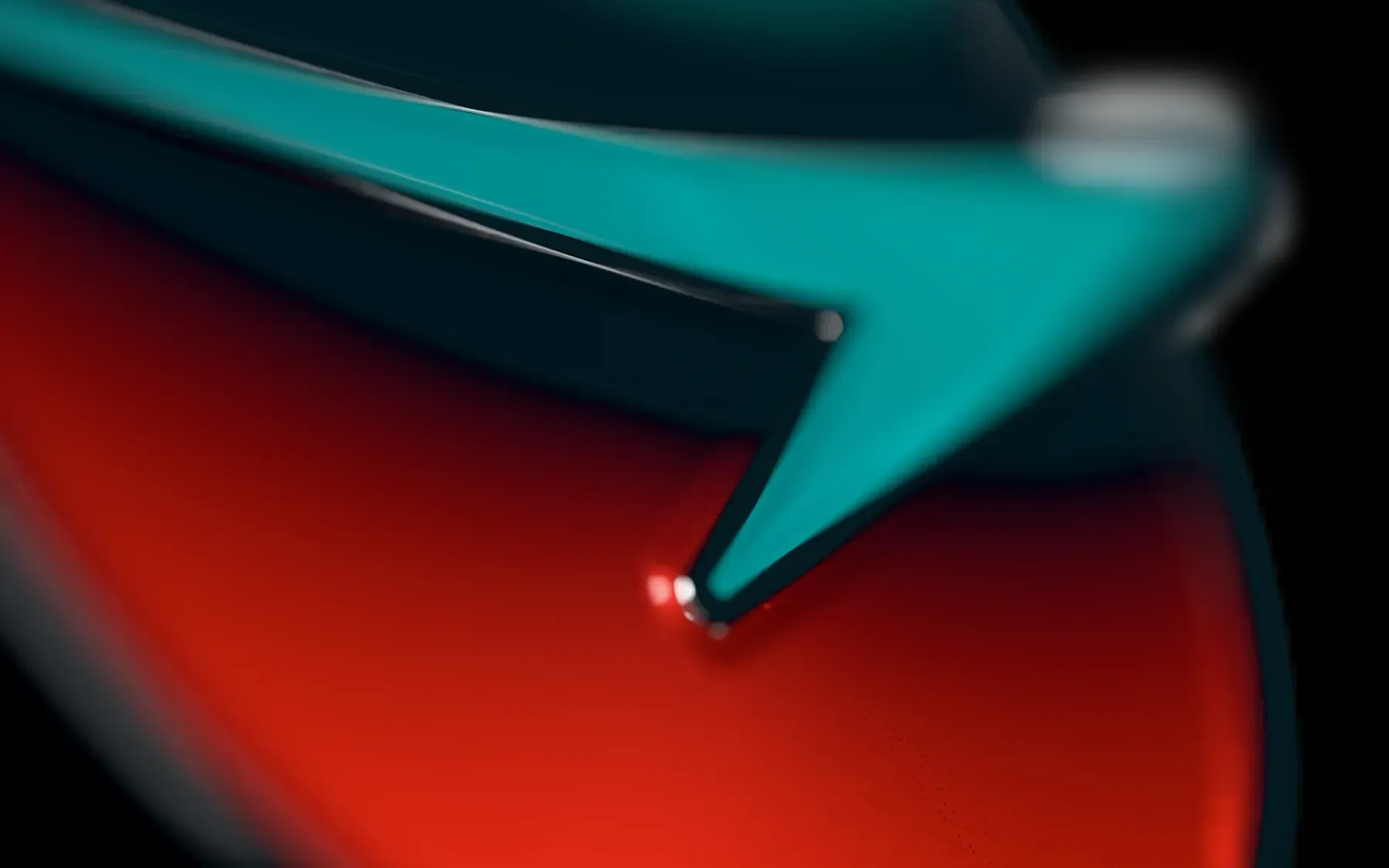 A raised nickel line tracing the swoosh over red enamel